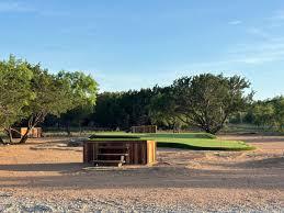 An Acre Golf short course under live oak trees